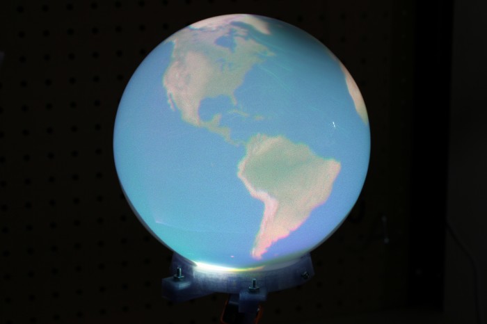Earth in Snow Globe
